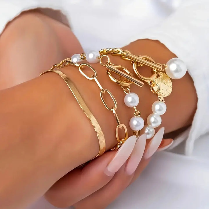 Chic Gold Bracelet Set (4 pieces) – Snake, Pearls, and Links