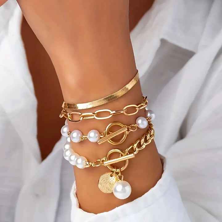 Chic Gold Bracelet Set (4 pieces) – Snake, Pearls, and Links