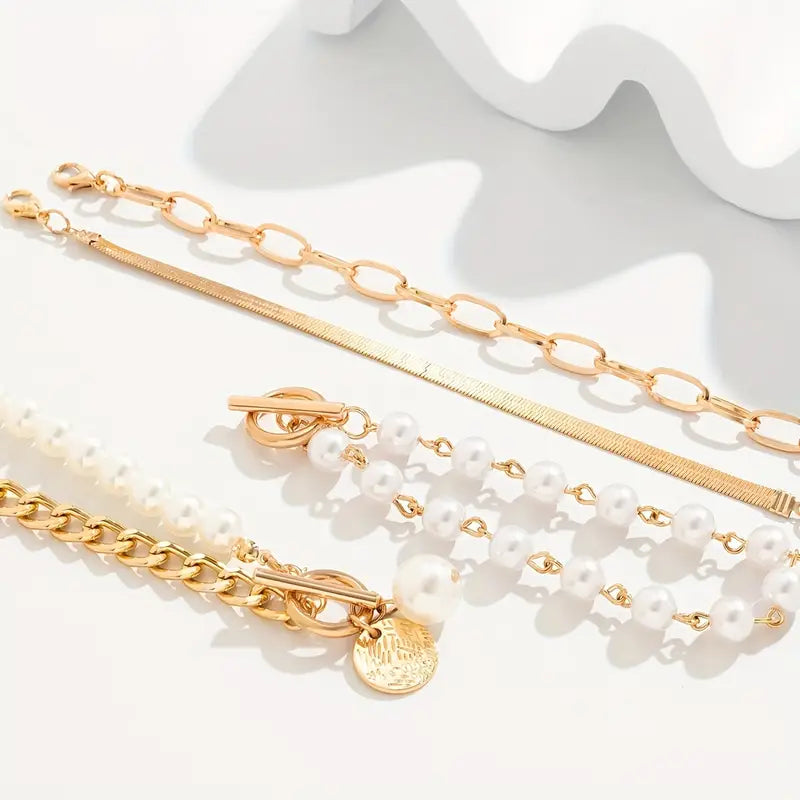 Chic Gold Bracelet Set (4 pieces) – Snake, Pearls, and Links