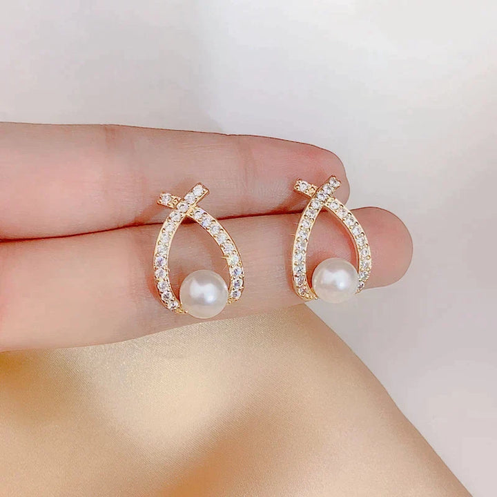 Pendientes con perlas y purpurina
