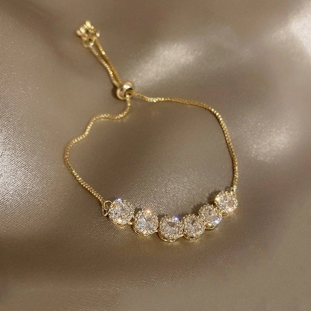 Pulsera de lujo ajustable con circonitas en oro