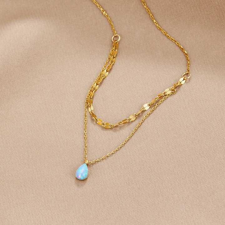 Layered necklace with a blue opal teardrop