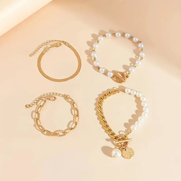 Chic Gold Bracelet Set (4 pieces) – Snake, Pearls, and Links